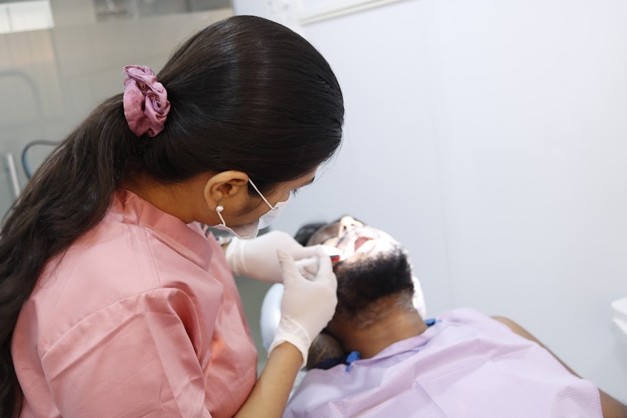 Dr. Monika Sonawane, best dentist in Ulwe, Navi Mumbai with her patient at All Dent, Dental Clinic in Ulwe, Navi Mumbai.